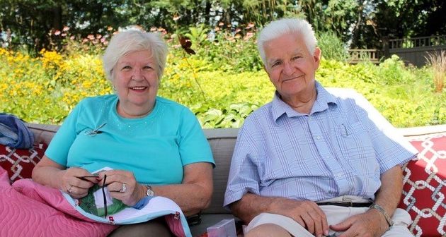 Anne and Peter sitting outside